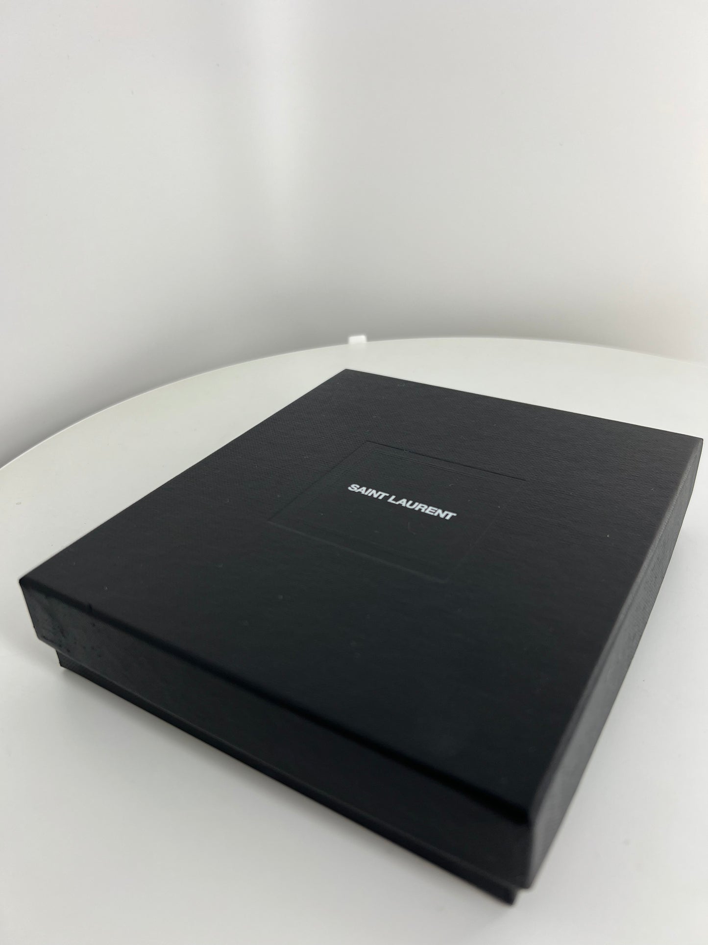 Portefeuille Saint Laurent Cassandre matelassé compact